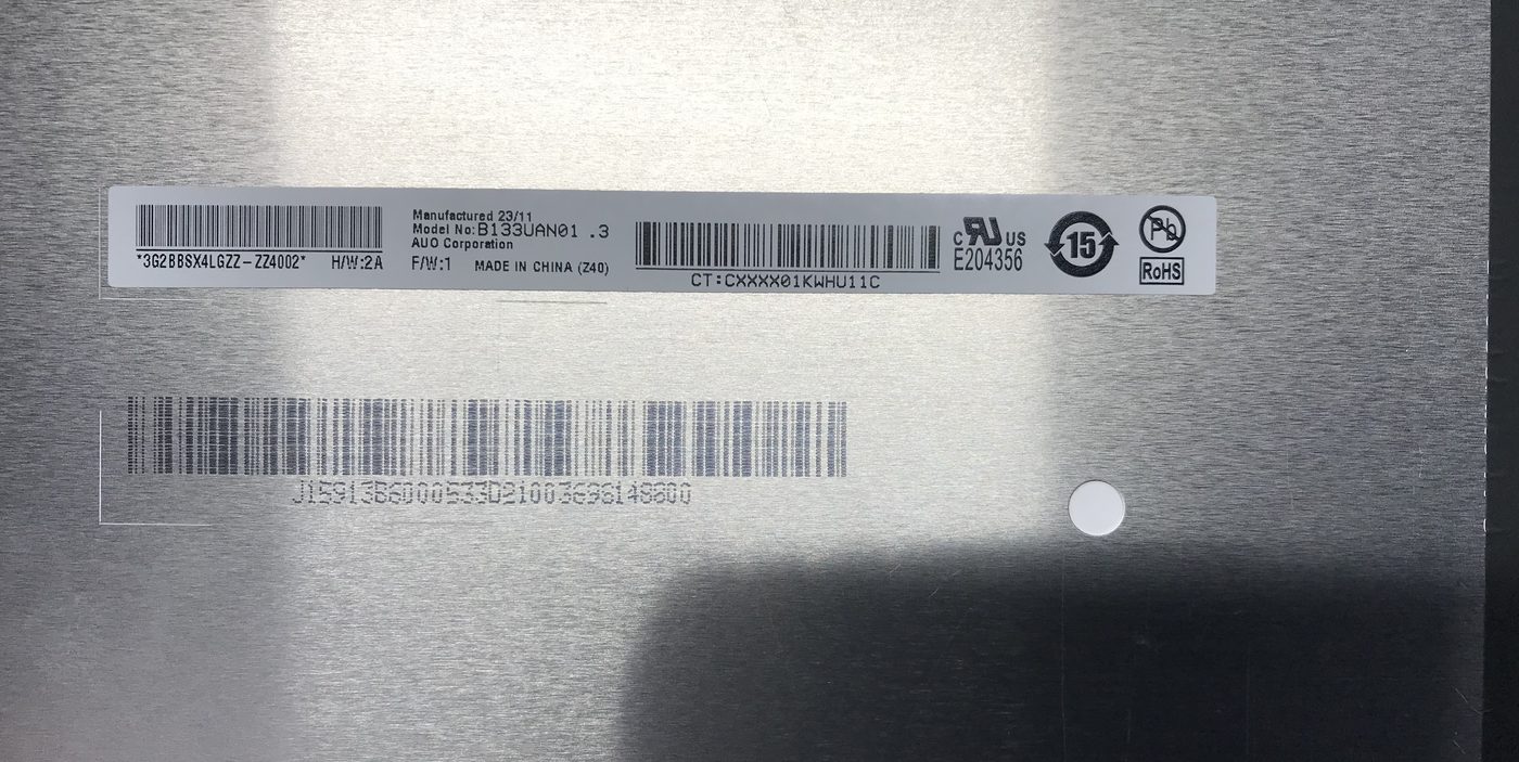 The part-number sticker on the back of a laptop LCD panel